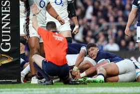 Referee Pierre Brousset awards a try for England's Tommy Freeman during the Guinness Men's Six Nations win over Scotland at Allianz Stadium, London. 