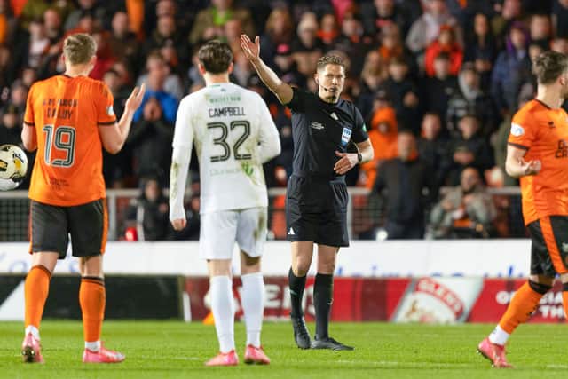 Referee David Dickinson signals to disallow Sam Dalby's goal for Dundee United in the 3-1 defeat to Hibs at Tannadice. (Photo by Ross Parker / SNS Group)