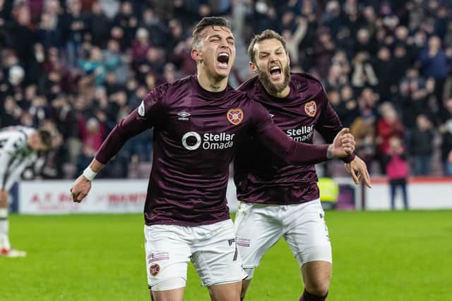 Hearts' Kenenth Vargas (L) celebrates with Jorge Grant (R) after scoring to make it 3-1 over St Mirren. (Photo by Mark Scates / SNS Group)