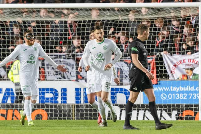 Nicky Cadden complains to referee David Dickinson after Dundee United's Sam Dalby's 'goal' against Hibs last night.