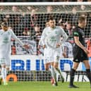 Nicky Cadden complains to referee David Dickinson after Dundee United's Sam Dalby's 'goal' against Hibs last night.