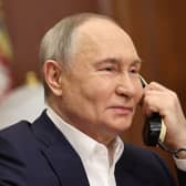 Vladimir Putin is trying to sow distrust and division in the hope of picking Western democracies apart, piece by piece (Picture: Alexander Kazakov)