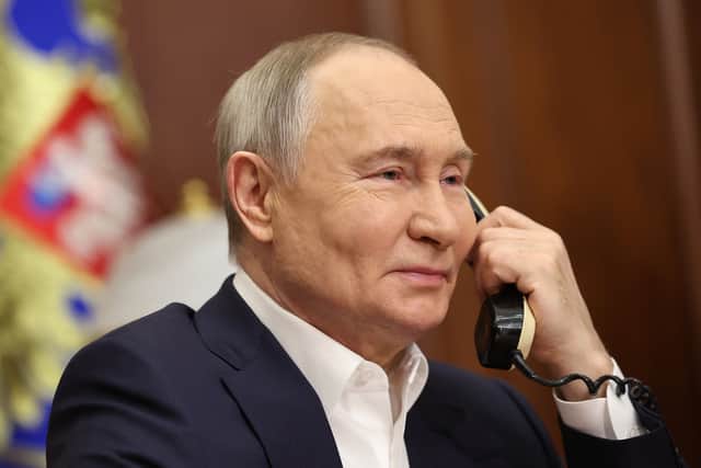 Vladimir Putin is trying to sow distrust and division in the hope of picking Western democracies apart, piece by piece (Picture: Alexander Kazakov)