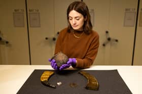 Dr Sarah Laurenson, of National Museums Scotland, with some of the items in the national collection to have their Gaelic origins retold and reinforced. PIC: Duncan McGlynn