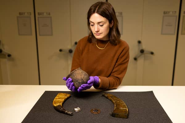 Dr Sarah Laurenson, of National Museums Scotland, with some of the items in the national collection to have their Gaelic origins retold and reinforced. PIC: Duncan McGlynn