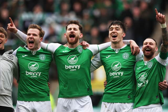 Hibs players Chris Cadden, Jack Iredale, Kieron Bowie and Martin Boyle sing Sunshine on Leith at full-time after the 1-0 win over Hearts at Easter Road. (Photo by Craig Williamson / SNS Group)