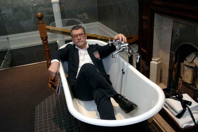 Jack Vettriano at One Devonshire Gardens in Glasgow. In the bath in the Vettriano Suite in 2009