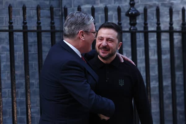 Keir Starmer embraces Volodymyr Zelensky in Downing Street on Saturday in stark contrast to the disgraceful treatment of the Ukrainian president by Donald Trump in Washington last week (Picture: Peter Nicholls)