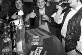 Men from the night shift at the Ferranti factory enjoy an early morning pint of beer at The Cavern pub in Leith, November 1981, following the introduction of early morning opening.