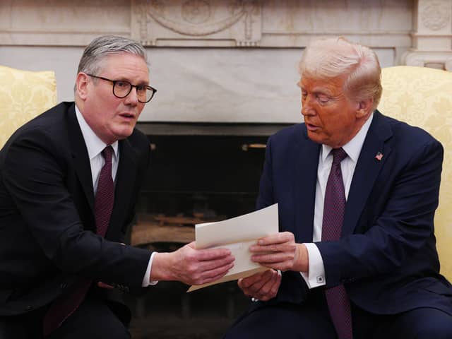 Keir Starmer did his best to flatter Donald Trump, presenting him with an invitation from King Charles to make an 'unprecedented' second state visit, but the diplomatic charm offensive may not be working (Picture: Carl Court/pool)