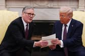 Keir Starmer did his best to flatter Donald Trump, presenting him with an invitation from King Charles to make an 'unprecedented' second state visit, but the diplomatic charm offensive may not be working (Picture: Carl Court/pool)