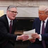 Keir Starmer did his best to flatter Donald Trump, presenting him with an invitation from King Charles to make an 'unprecedented' second state visit, but the diplomatic charm offensive may not be working (Picture: Carl Court/pool)