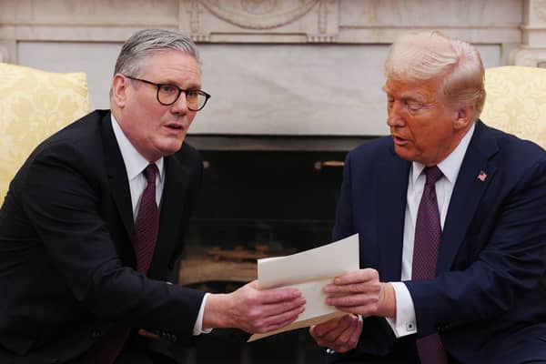 Keir Starmer did his best to flatter Donald Trump, presenting him with an invitation from King Charles to make an 'unprecedented' second state visit, but the diplomatic charm offensive may not be working (Picture: Carl Court/pool)