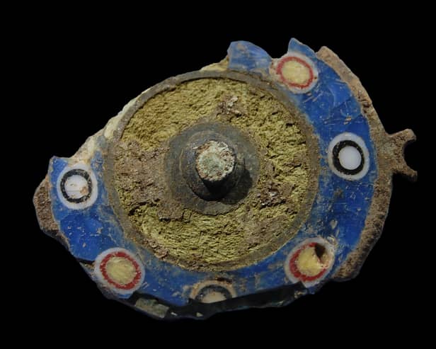 The Roman brooch found deep in the foundations of an Iron Age settlement. The item was buried in the 2nd Century AD. PIC: GUARD Archaeology.