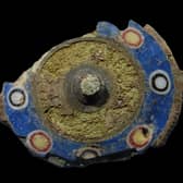The Roman brooch found deep in the foundations of an Iron Age settlement. The item was buried in the 2nd Century AD. PIC: GUARD Archaeology.