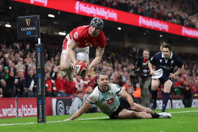 Wales played with more freedom in the defeat by Ireland. Here, Tom Rogers scores his team's second try.