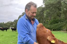 Neil Stewart, who took his own life last year, with Crunchie the cow 