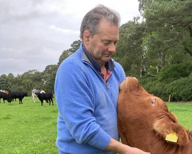 Neil Stewart, who took his own life last year, with Crunchie the cow 