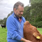 Neil Stewart, who took his own life last year, with Crunchie the cow 