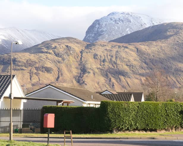 Ben Nevis towering above the town of Caol, just outside Fort William, which is on the first leg of the Great Glen Way if you walking it from south to north 