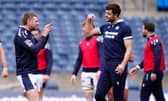 Finn Russell (left) and Blair Kinghorn during Scotland's team run at Scottish Gas Murrayfield before the Wales game.