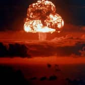 A signature mushroom cloud rises from a nuclear bomb explosion on Bikini Atoll in 1954 (Picture: Galerie Bilderwelt)