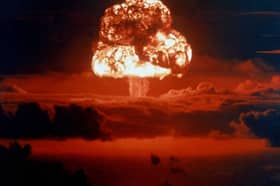 A signature mushroom cloud rises from a nuclear bomb explosion on Bikini Atoll in 1954 (Picture: Galerie Bilderwelt)