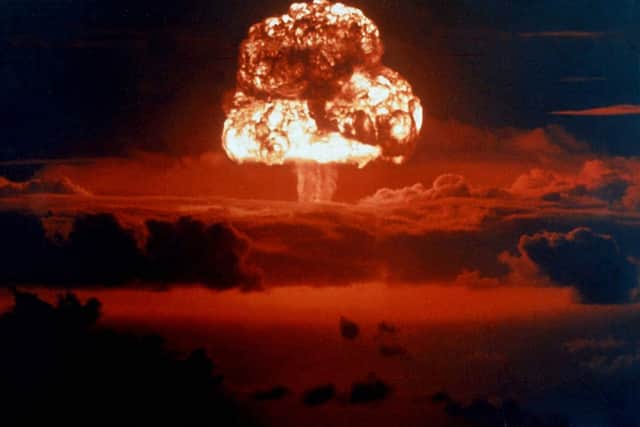 A signature mushroom cloud rises from a nuclear bomb explosion on Bikini Atoll in 1954 (Picture: Galerie Bilderwelt)