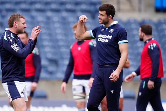 Finn Russell (left) and Blair Kinghorn during Scotland's team run at Scottish Gas Murrayfield before the Wales game.