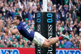 France's Damian Penaud scores their side's fifth try of the game  against Ireland.