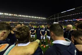Finn Russell speaks to the Scotland team after the win over Wales.