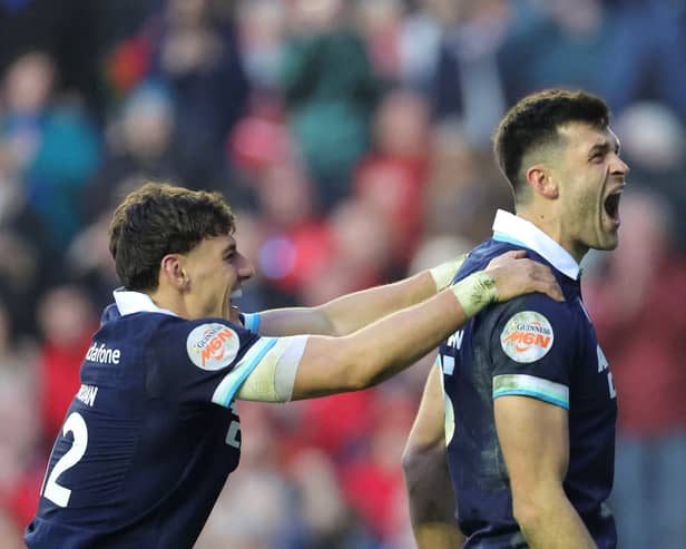 Scotland's Blair Kinghorn celebrates scoring his side's fifth try of the game against Wales. It was the full-back's second.
