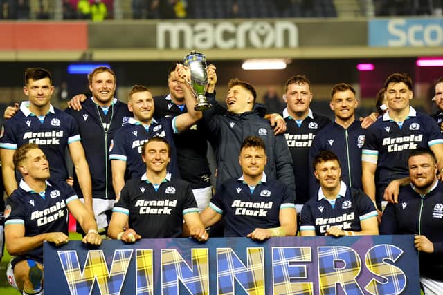 Scotland celebrate with the Doddie Weir Cup after beating Wales in the Guinness Six Nations at Murrayfield.