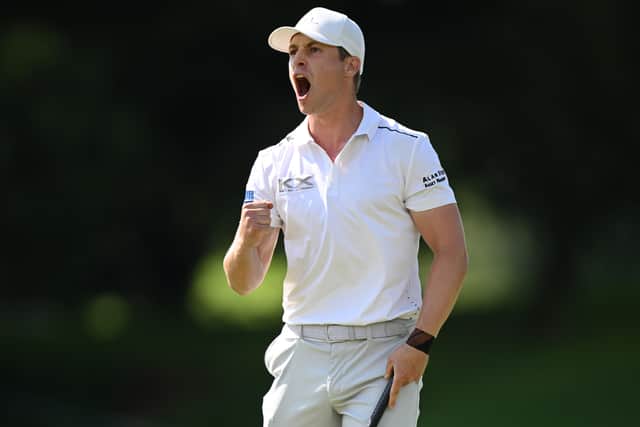 Calum Hill roars ‘come on’ after holing a birdie putt on the 18th green in the fimal round the Joburg Open at Houghton Golf Club in Johannesburg
