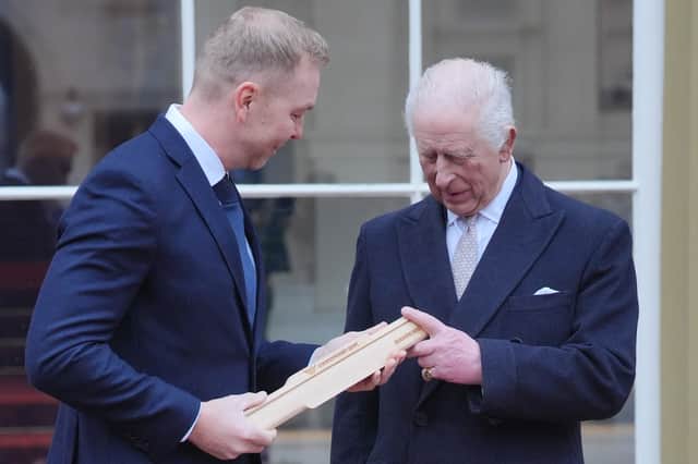 King Charles with Sir Chris Hoy during the launch of the Commonwealth Sport King's Baton Relay at Buckingham Palace on Monday (Picture: Jonathan Brady)