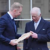King Charles with Sir Chris Hoy during the launch of the Commonwealth Sport King's Baton Relay at Buckingham Palace on Monday (Picture: Jonathan Brady)