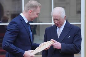 King Charles with Sir Chris Hoy during the launch of the Commonwealth Sport King's Baton Relay at Buckingham Palace on Monday (Picture: Jonathan Brady)