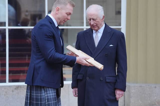 King Charles with Sir Chris Hoy during the  launch of the Commonwealth Sport King's Baton Relay, officially starting the countdown towards the Glasgow 2026 Commonwealth Games at Buckingham Palace, London