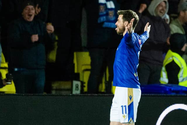 St Johnstone's Graham Carey celebrates his stunning winner over Livingston in the Scottish Cup quarter-final. (Photo by Paul Devlin / SNS Group)