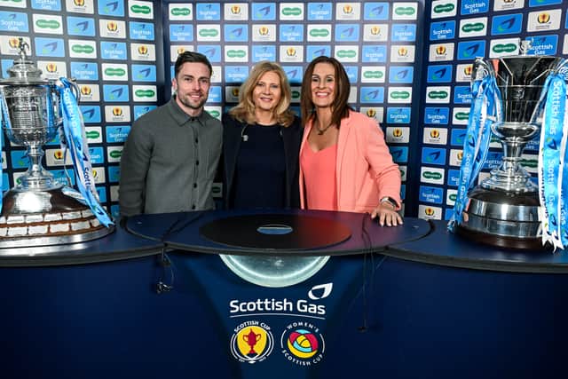 Lewis Stevenson (left) and Julie Fleeting (right) conduct the Scottish Gas Men's Scottish Cup semi-final draw alongside Jane Lewis (centre). (Photo by Paul Devlin / SNS Group)