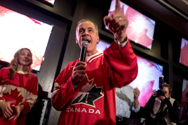 Mark Carney, who has since become Canada's Prime Minister and Liberal leader, speaks to supporters at a party to watch an ice hockey game against the US last month (Picture: Andrej Ivanov)