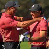 Tiger Woods celebrates with son Charlie after making a the first hole-in-one of his career during the PNC Championship at Ritz-Carlton Golf Club in Florida last December