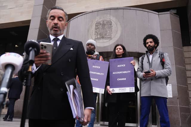 Solicitor Aamer Anwar speaking outside  Glasgow Sheriff Court, where a preliminary hearing for Fatal Accident Inquiry into the death of Badreddin Abdalla Adam Bosh, who was shot and killed by police after he attacked six people, stabbing and seriously injuring five of them at Park Inn Hotel in 2020, was being held