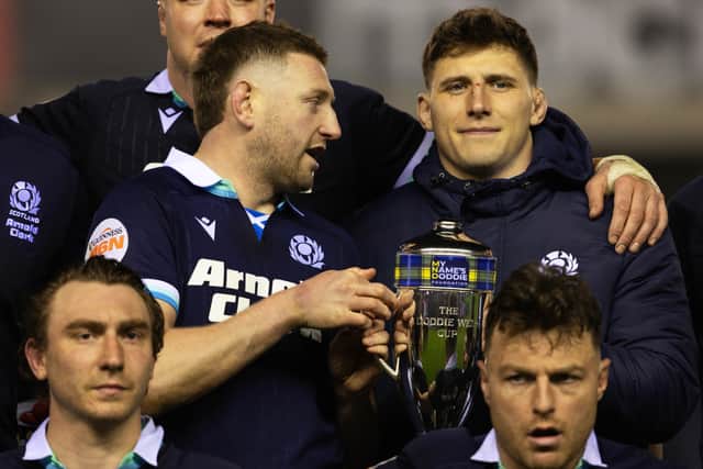 Scotland co-captains Finn Russell (left) and Rory Darge with the Doddie Weir Cup after the 35-29 win over Wales.