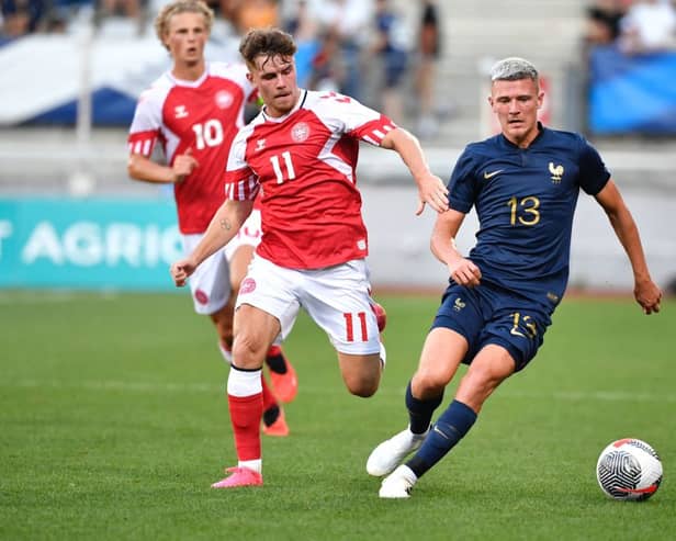 Mathias Kvistgaarden (L) has been heavily linked with a move to Celtic. Cr: Getty Images.