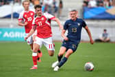 Mathias Kvistgaarden (L) has been heavily linked with a move to Celtic. Cr: Getty Images.