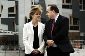 New deputy SNP leader Nicola Sturgeon with Alex Salmond after he was declared winner of the Scottish National Party leadership campaign in Edinburgh in 2004. The former leader won 4,952 votes, some 76 percent of the total, and was joined in office by his running mate, who comfortably won election as deputy leader