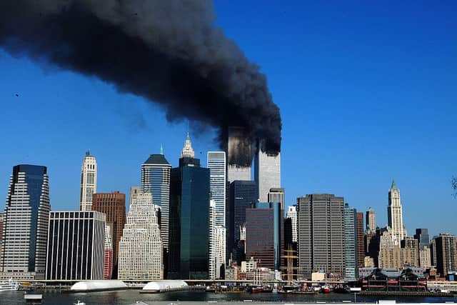 The twin towers of the World Trade Centre billow smoke after hijacked airliners crashed into them on 11 September 2001. Picture: Henny Ray Abrams/AFP/Getty