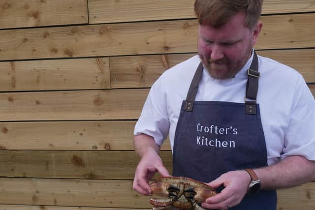 Grant with a fresh crab