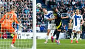 Scotland's Lawrence Shankland scores to make it 2-0 during an International Friendly match between Scotland and Finland at Hampden Park in June 2024. Cr: SNS Group.